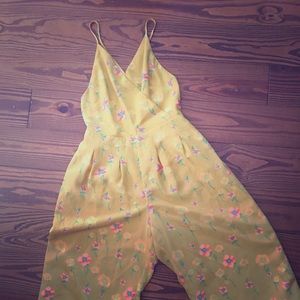 Yellow jumpsuit. It has an open back!